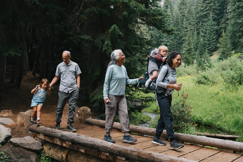 Image: multiracial multigenerational family on a hike.
