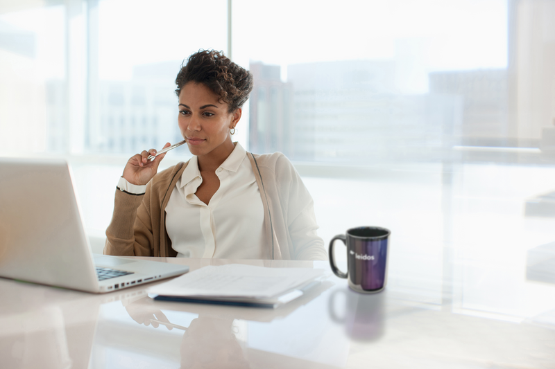 webimage-Image-leidos-businesswoman-using-laptop-in-office