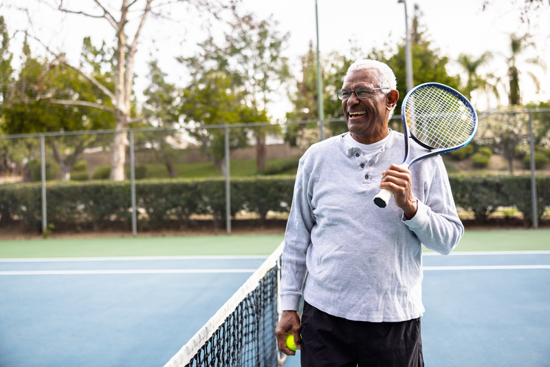 Older man on a tennis court